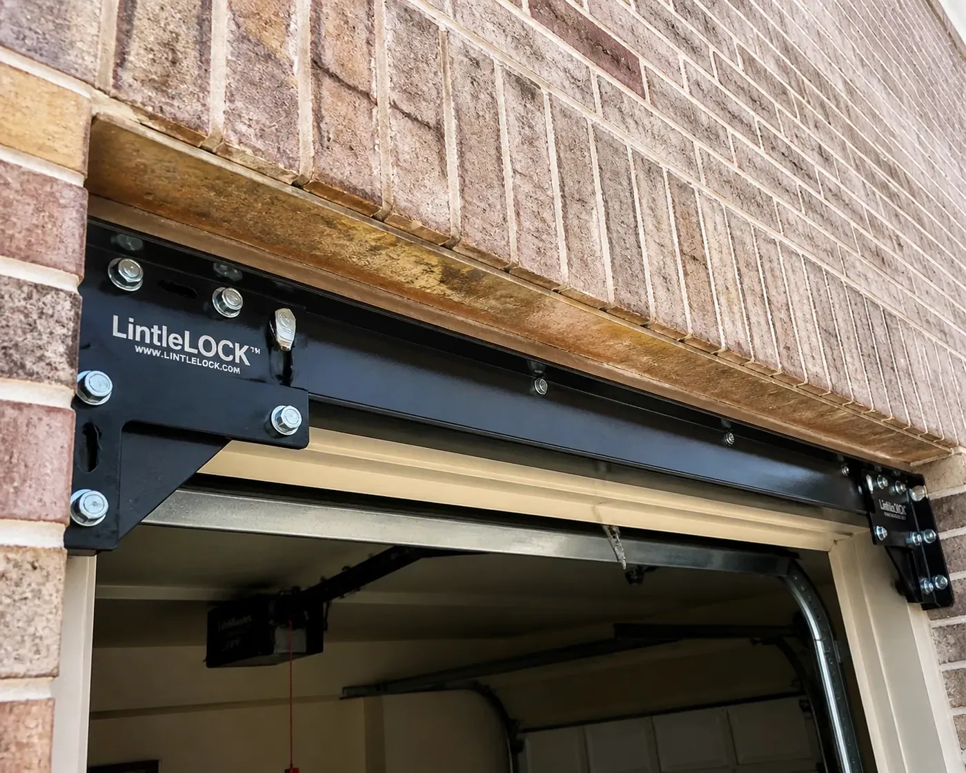 Professional LintelLOCK™ system installation correcting a sagging garage lintel for permanent Dallas brick repair.